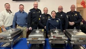 Burlington High School Students Team Up With Police to Serve Seniors at Holiday Luncheon 2 bpd at luncheon