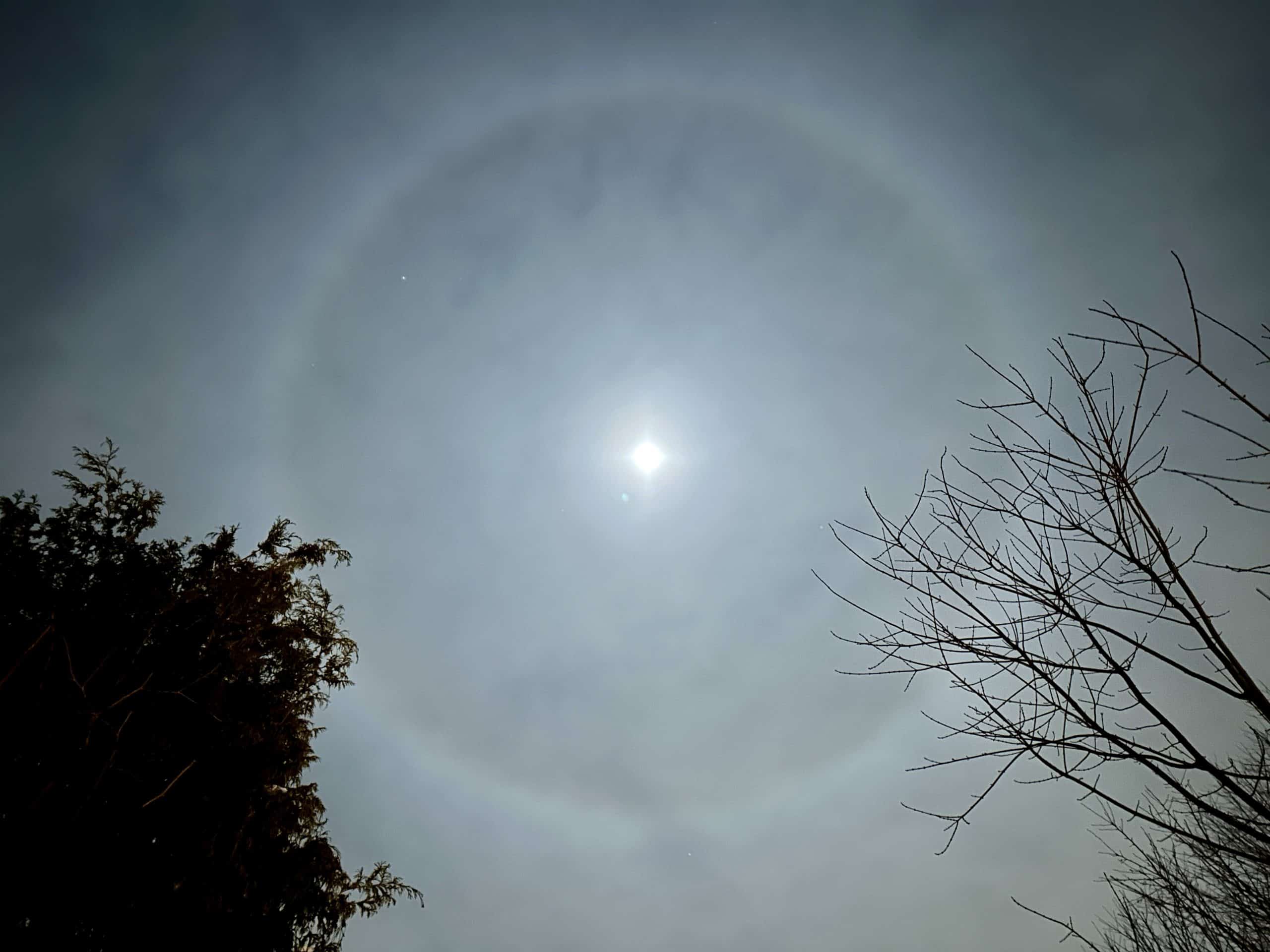 Photo of the Week: A Halo Watching Over Us 4 1 30 26 mary leach ce crystals cause a hal around the moon but i like to think its a sign from my mother who recently passed away and that shes looking out for me. scaled